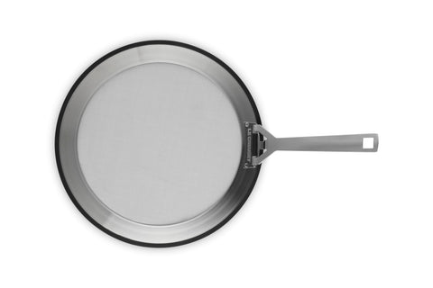 Le Creuset silicone rim detail protecting pan edge and preventing scratches