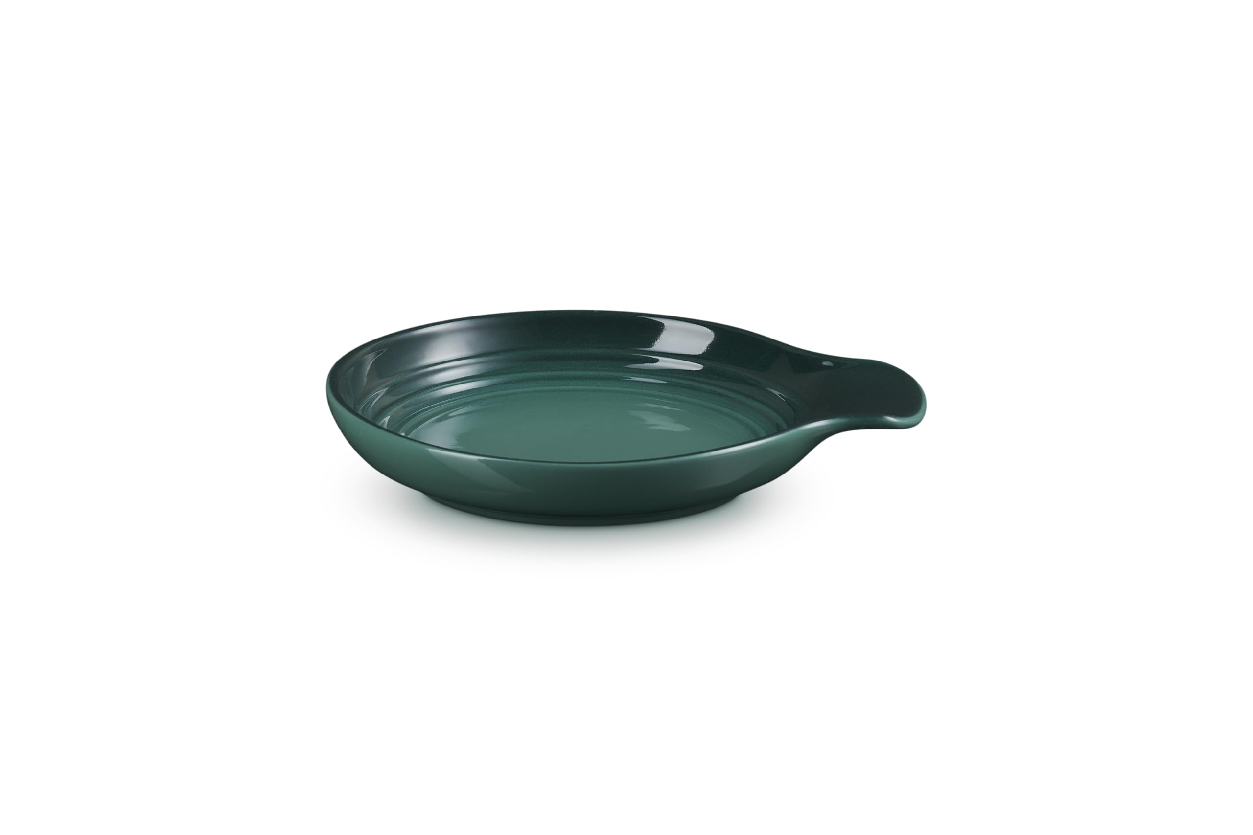 Le Creuset spoon rest angled profile highlighting durable stoneware and countertop protection