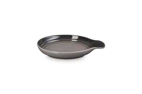 Le Creuset spoon rest glaze close-up highlighting durable nonporous surface benefit