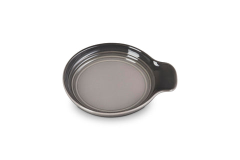Le Creuset spoon rest front view showing Oyster finish and tidy countertop benefit