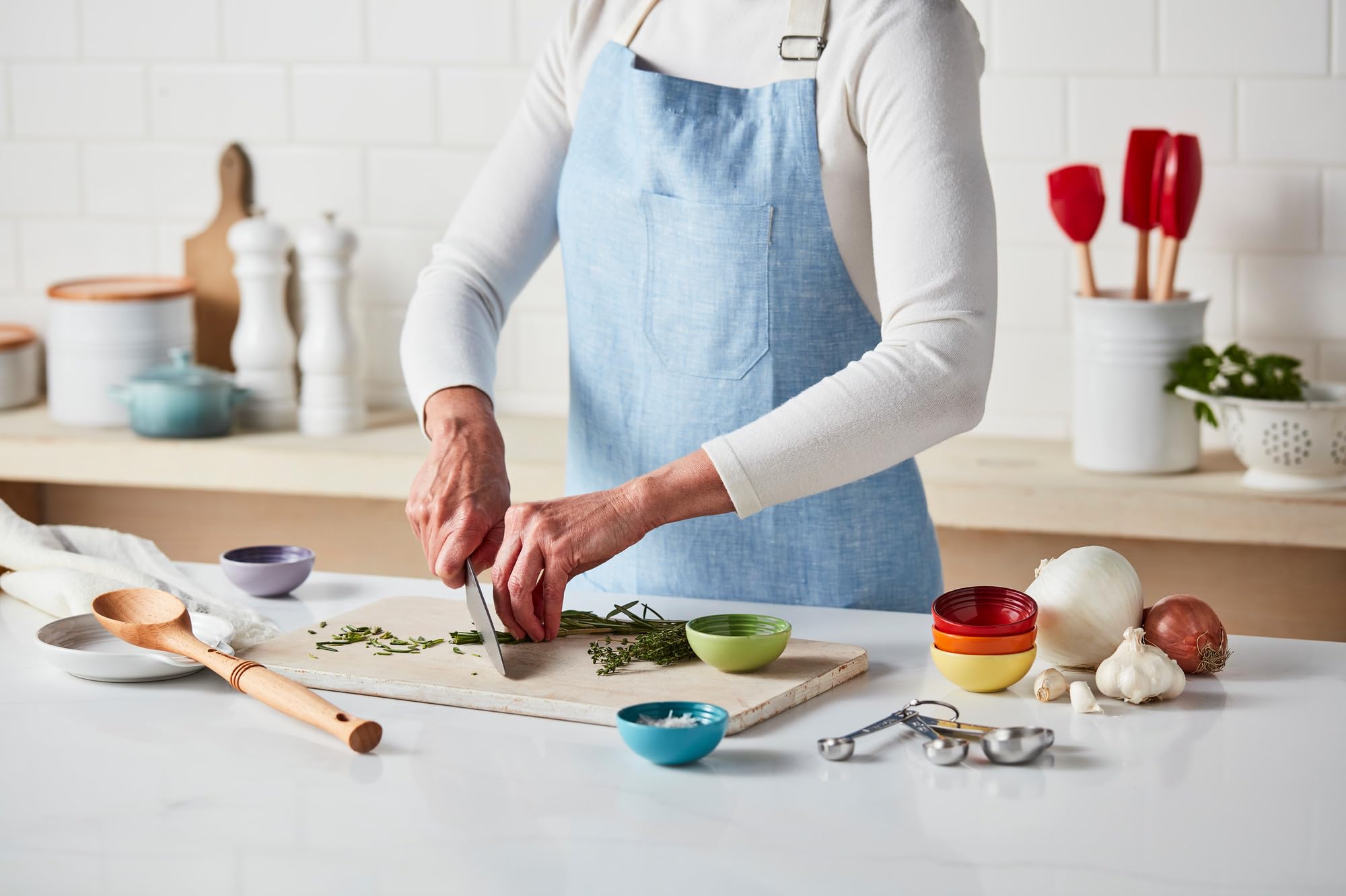Le Creuset spoon rest on breakfast table keeping linens clean and styled benefit