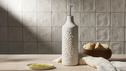 Le Creuset cruet on table setting demonstrating refined presentation and function