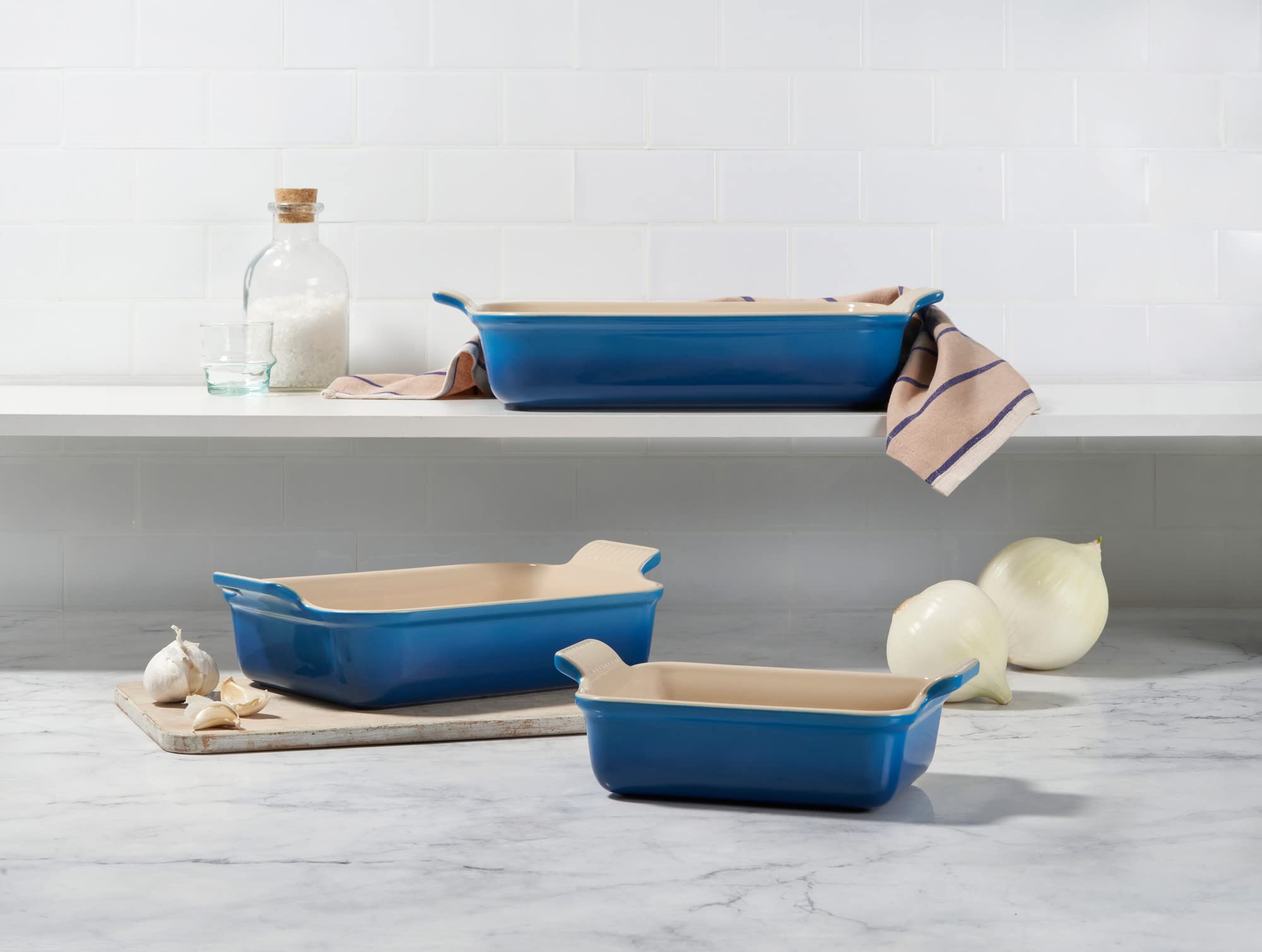 Le Creuset three nested rectangular dishes stacked to save space and simplify storage