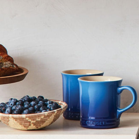 Le Creuset Vancouver Mug Peche holding soup to show oven-to-table versatility