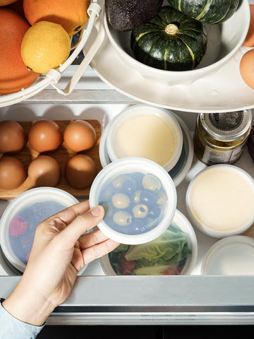 LE TAUCI stacked ramekins illustrating space-saving storage in a kitchen cabinet