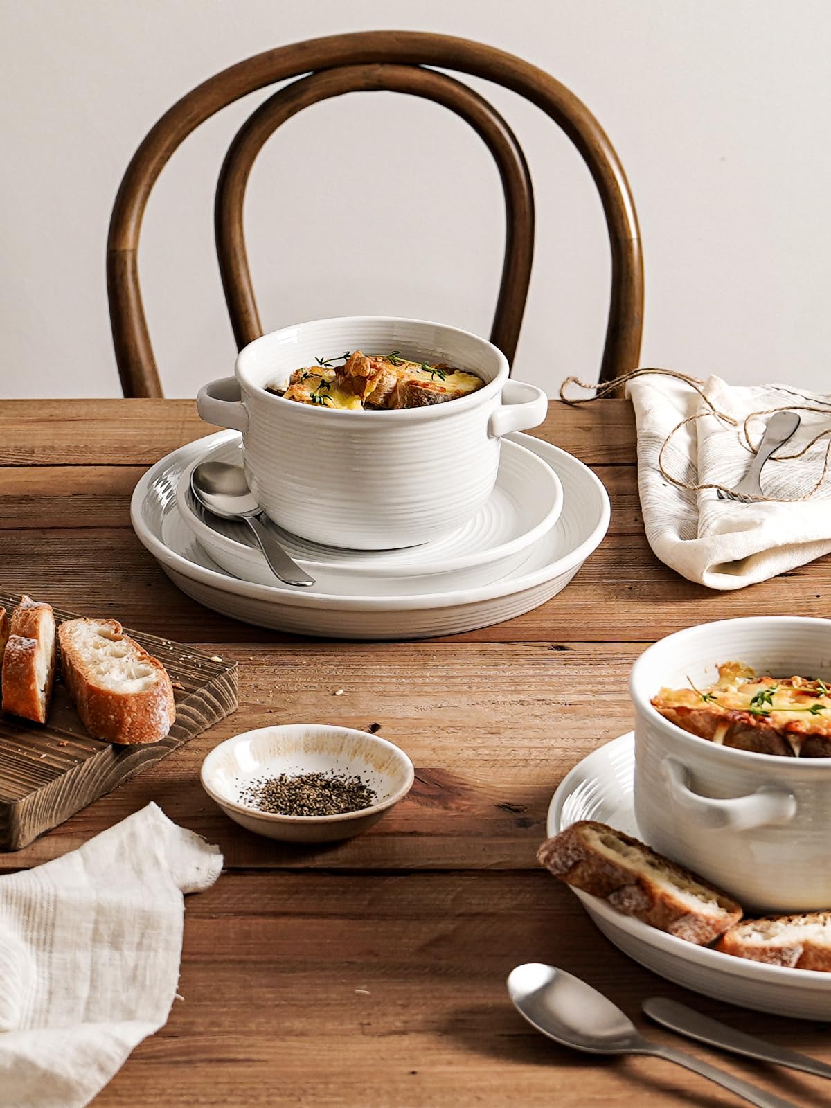 LE TAUCI nested bowls stacked in cabinet, illustrates space-saving storage