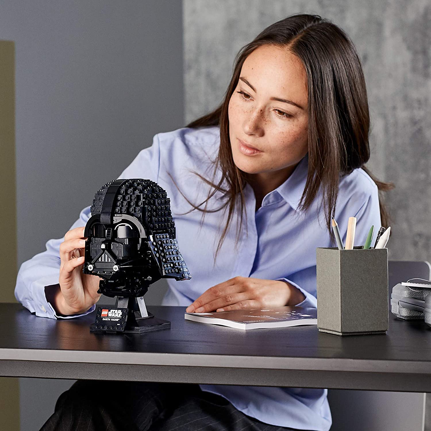 LEGO Darth Vader helmet on angled display stand showing stable presentation benefit