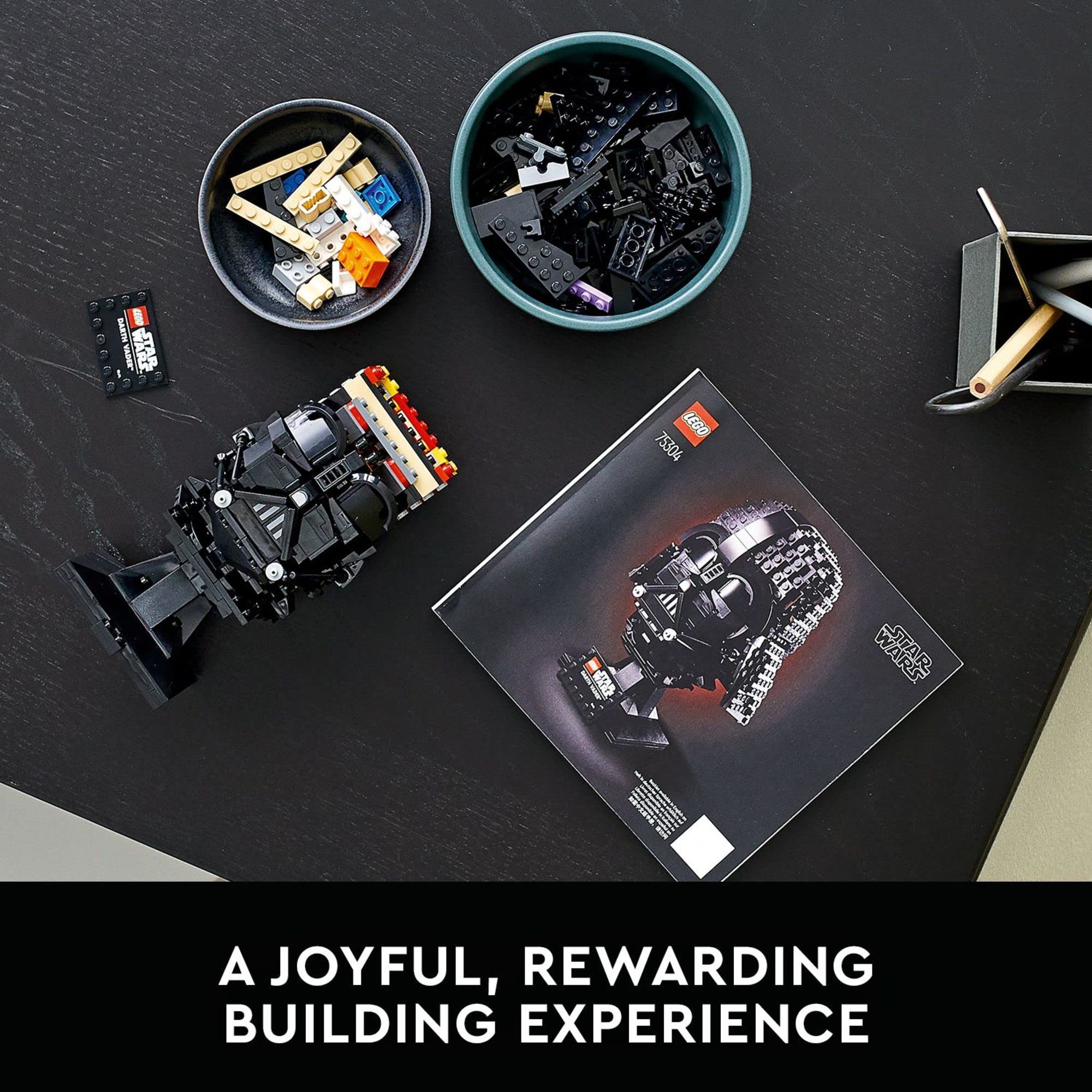 LEGO Darth Vader helmet spread of pieces laid out to aid organized building