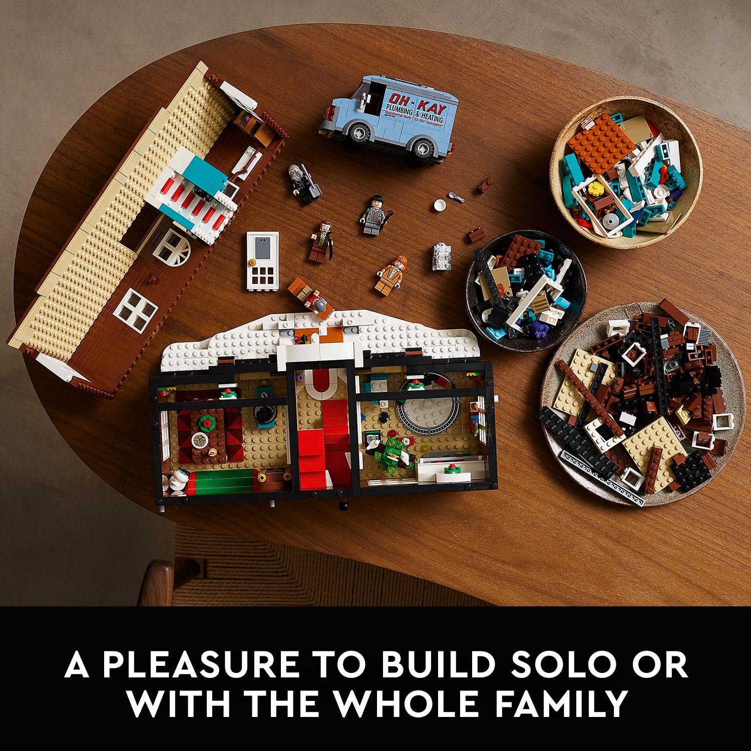 LEGO Home Alone completed model on bookshelf showcasing scale and decorative appeal