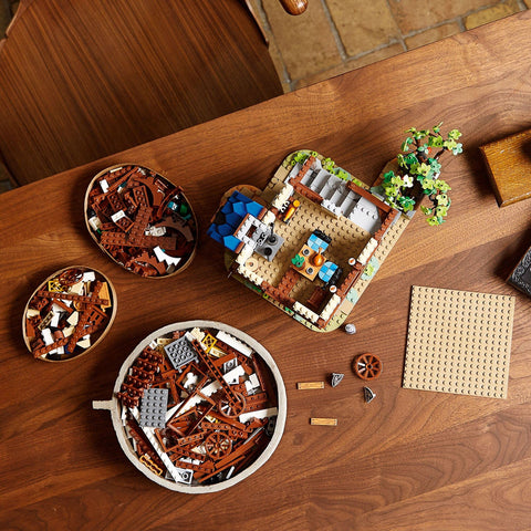 LEGO medieval blacksmith minifigures and animals arranged to enhance storytelling