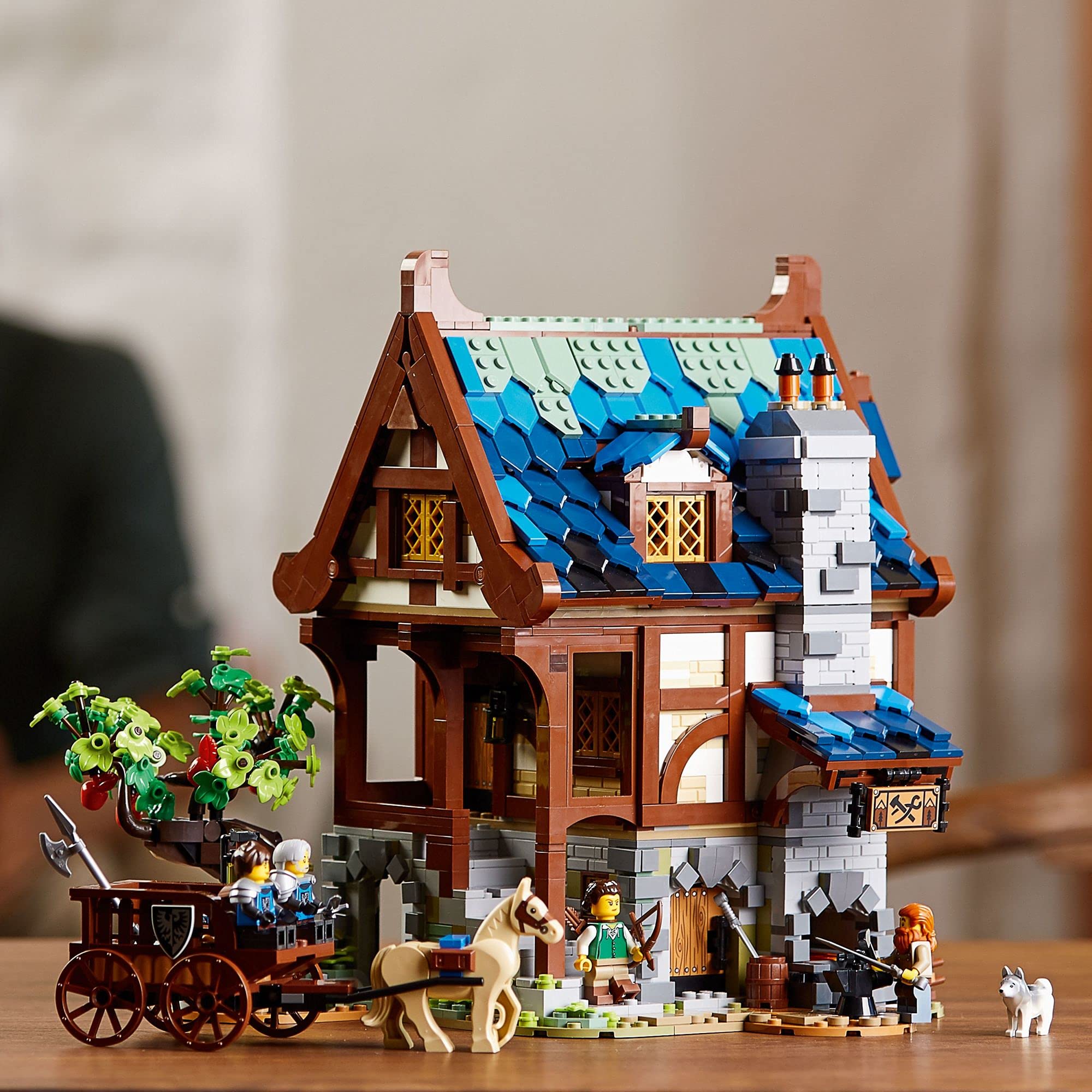 LEGO medieval blacksmith posed display in living room offering decorative shelf appeal