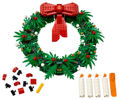 LEGO Iconic wreath staged on a mantel, shows scale, festive presence, and easy shelf display
