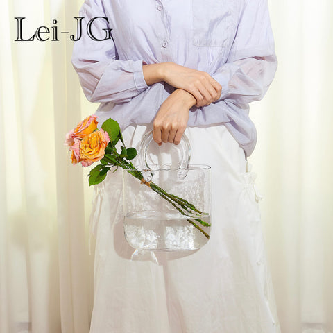 Lei-JG handle detail showing reinforced grip and stable carrying benefit