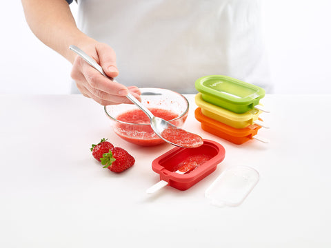 Lékué mold in hand to show scale and generous portion size for satisfying treats