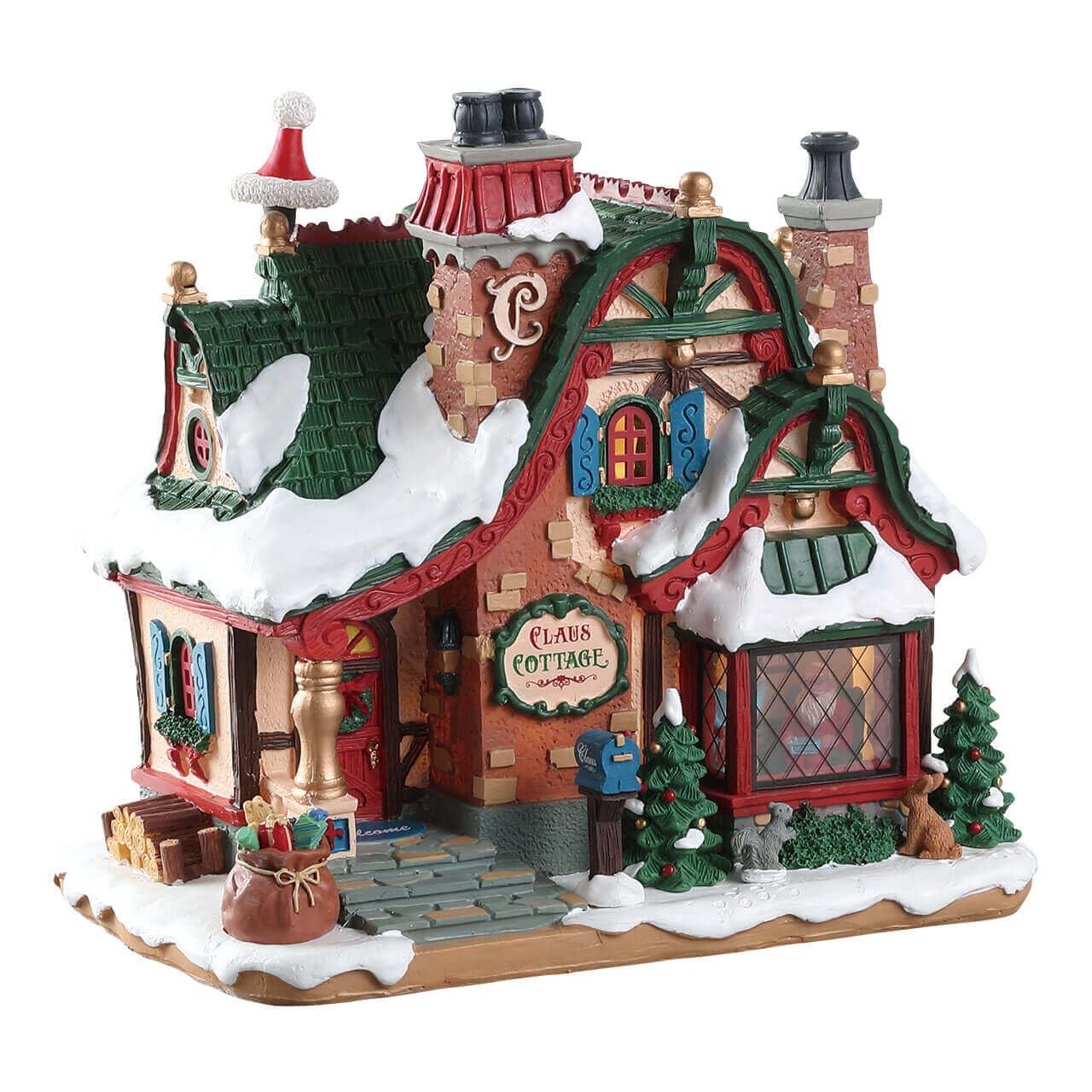 Lemax Claus Cottage front view showing lit windows and festive detail for warm ambiance