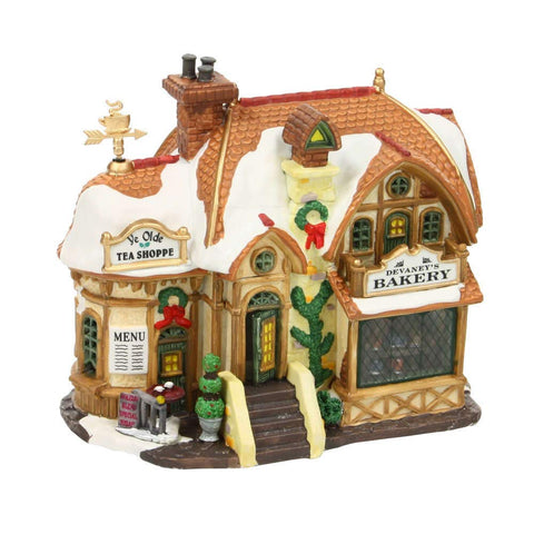 Lemax Devaneys Bakery front view showing porcelain detail and inviting glow