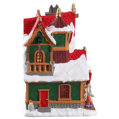 Lemax Elf Workshop displayed with other village buildings to show scale and cohesion