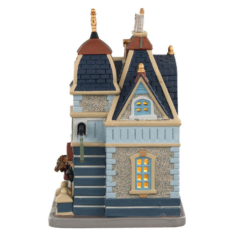 Lemax figurine placed in a village scene adding community storytelling