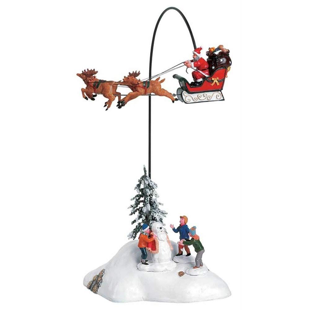 Lemax porcelain building front view with flying Santa, festive focal point