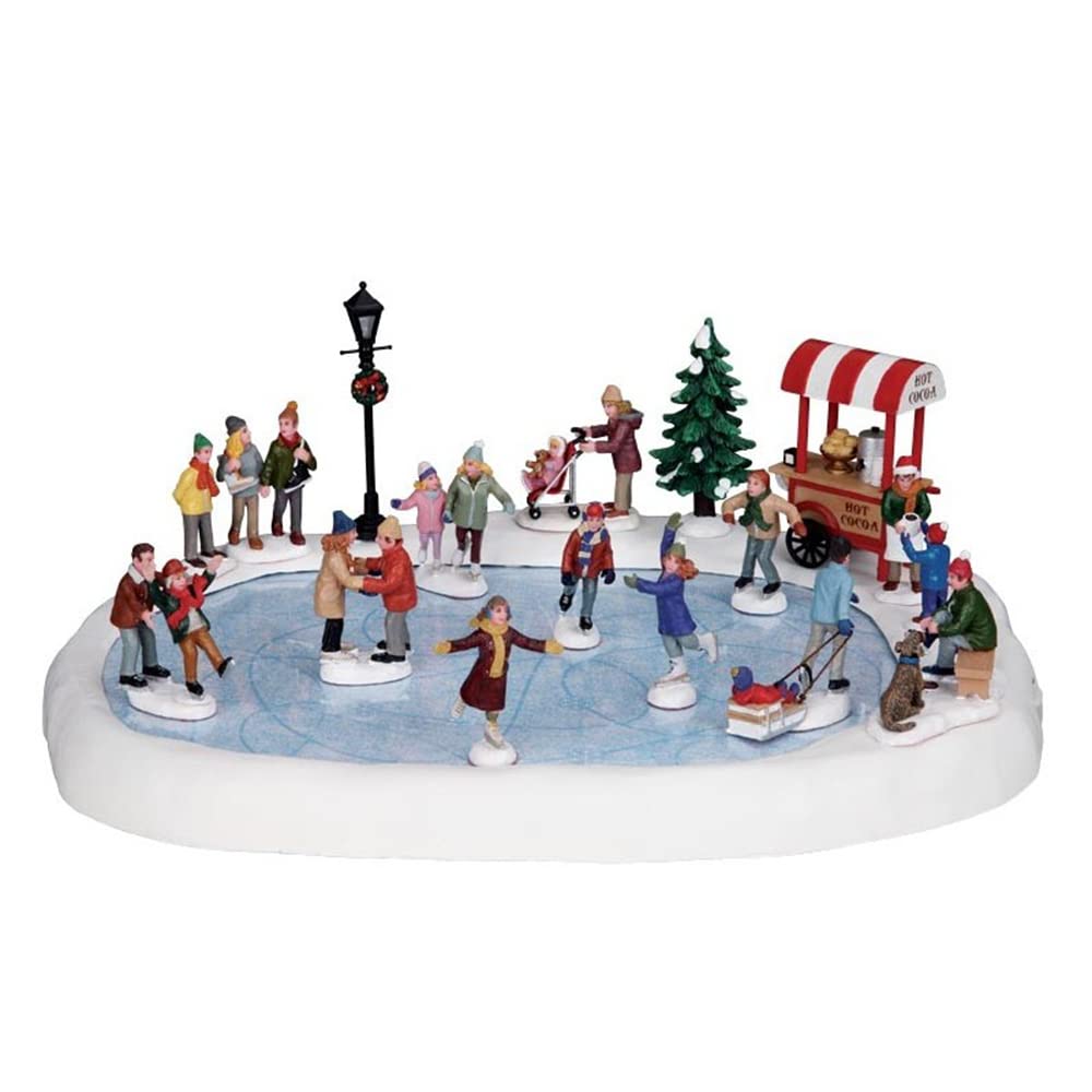 Lemax skating pond front view showing skaters and festive motion, adds lively display