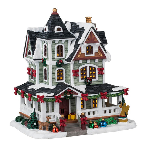 Lemax Whitbey Residence front view with warm glowing lights for festive ambiance