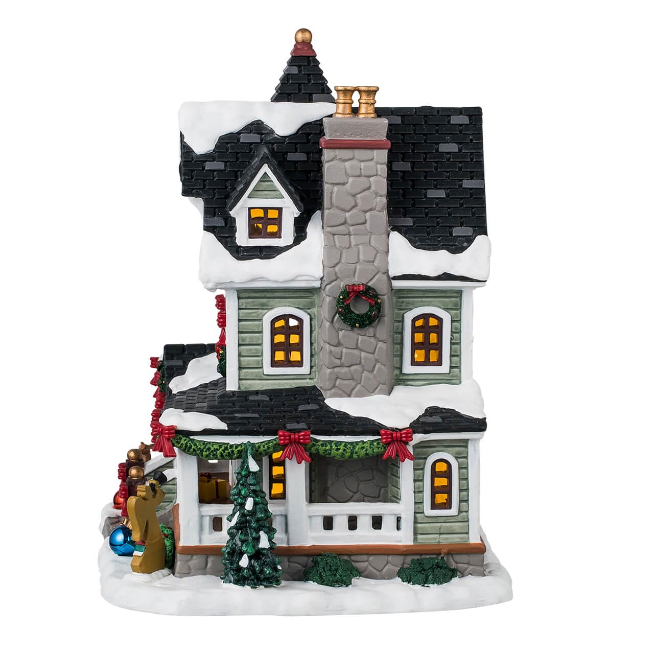 Lemax Whitbey Residence displayed on mantel to anchor holiday village arrangements