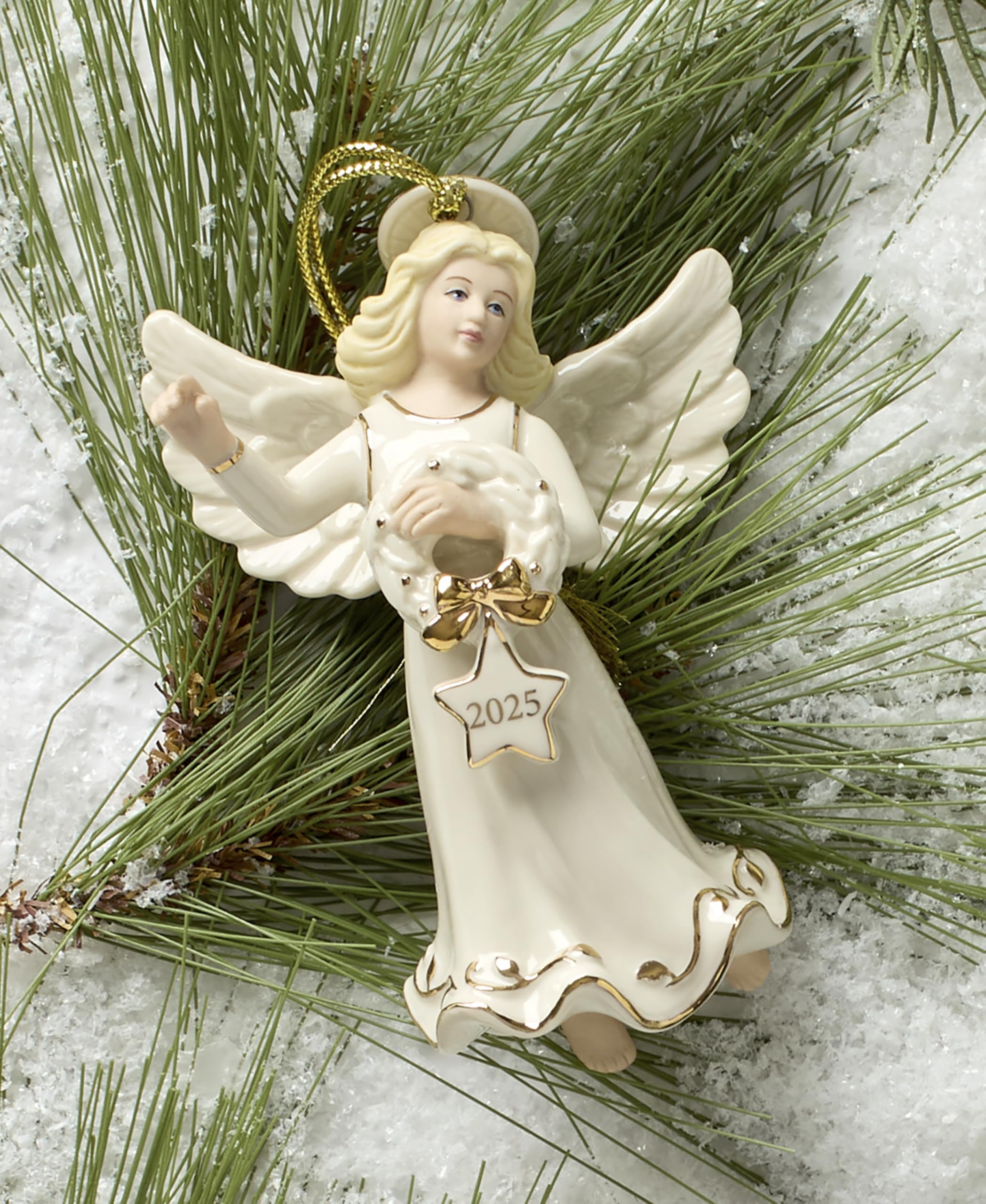 Lenox ornament held in hand demonstrating size and weight benefit: easy-to-hang keepsake
