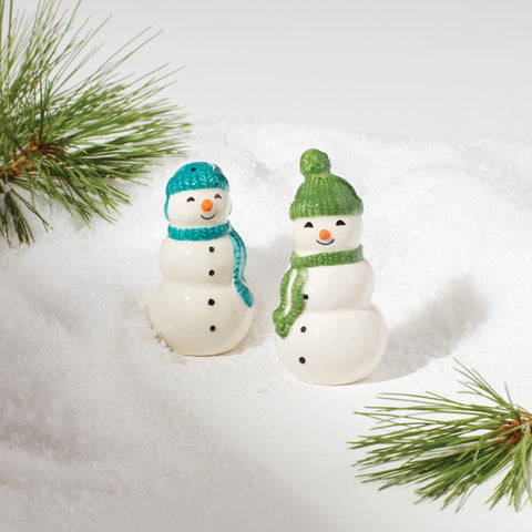 Lenox snowman next to spoon for scale showing compact practical size benefit