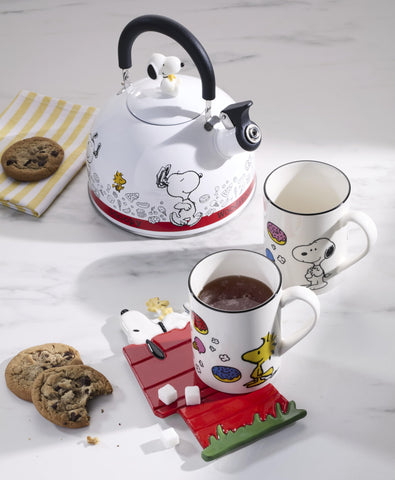 Lenox Chef Snoopy kettle on stovetop illustrating stainless-steel base and even heating