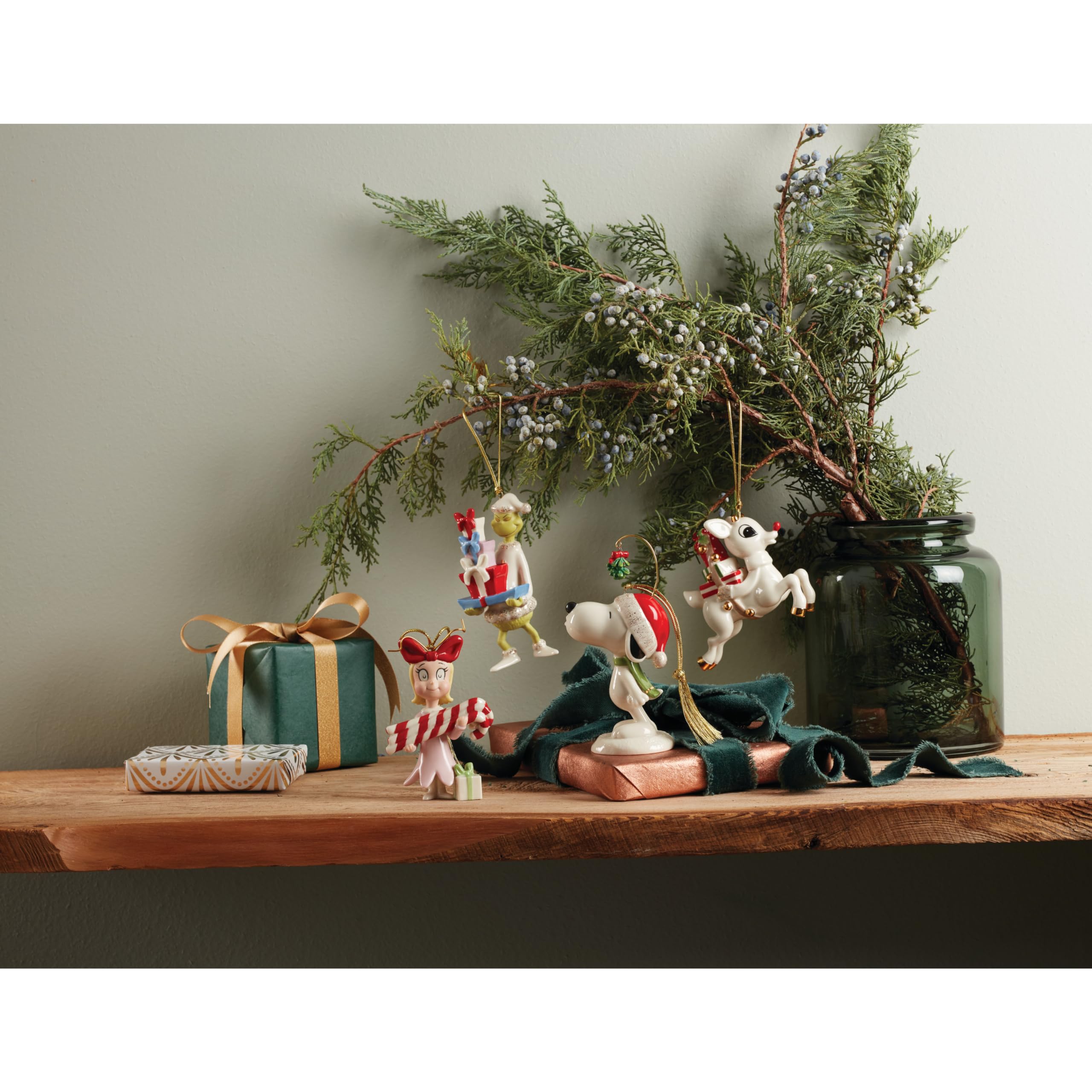 Lenox Cindy Lou Who ornament held in hand to show scale and easy-hanging feature