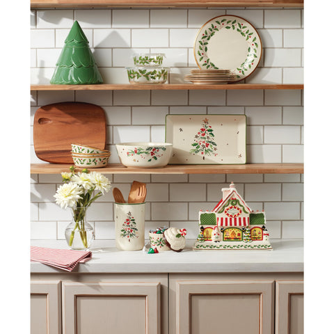 Lenox cupcake jar on a mantel with garland showing holiday styling benefit