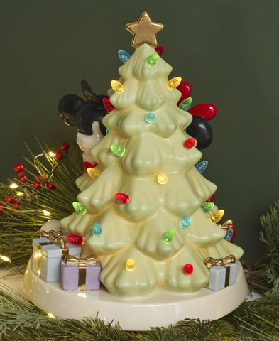 Lenox figurine lit in dark illustrating vibrant lights and cozy evening ambiance