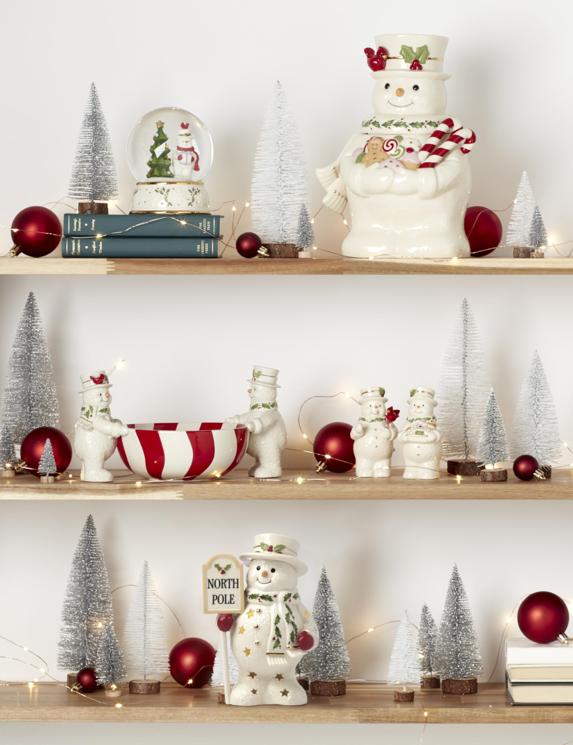 Lenox figurine next to candle demonstrating compact 7.75-inch height and scale