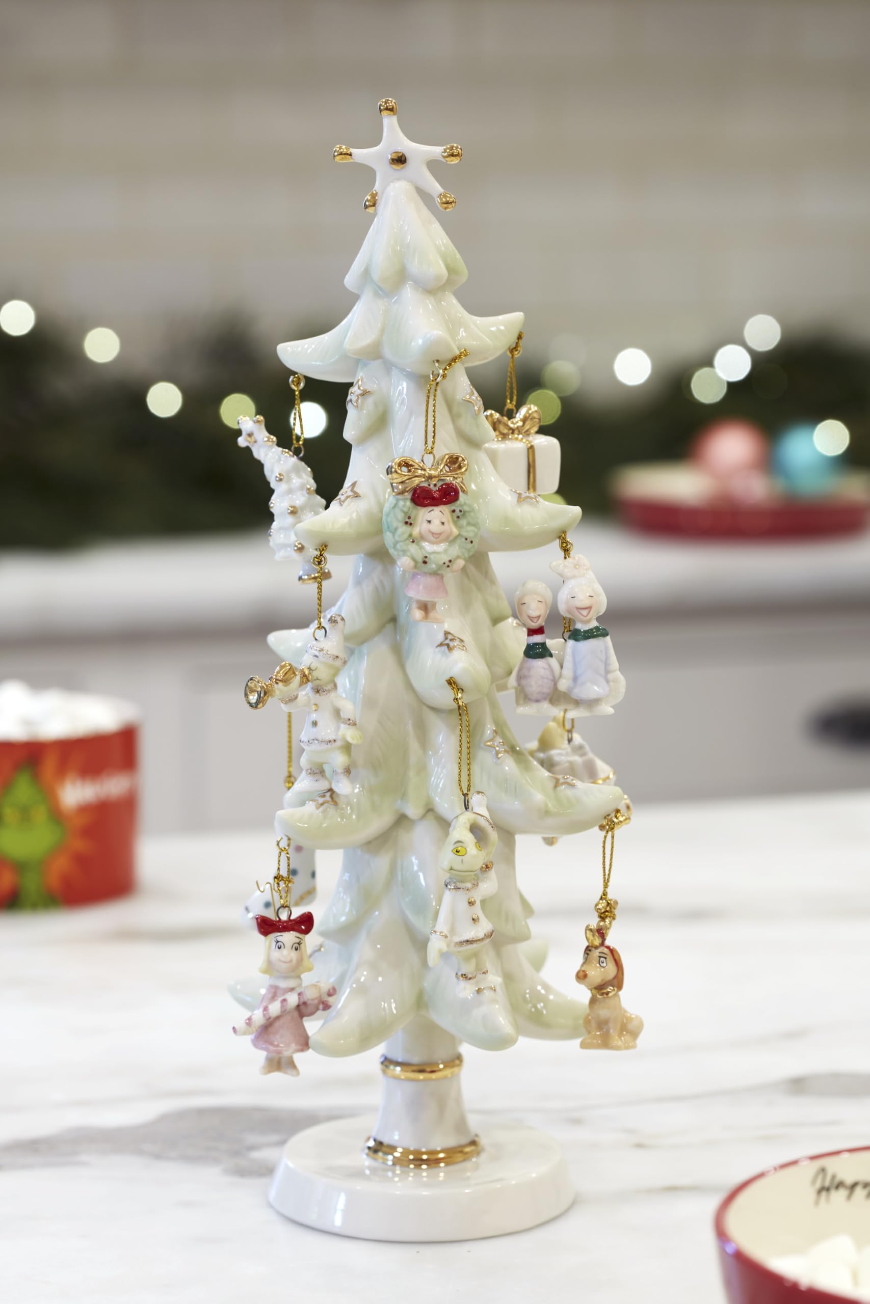 Lenox Grinch set on mantel showing compact size and staging benefit