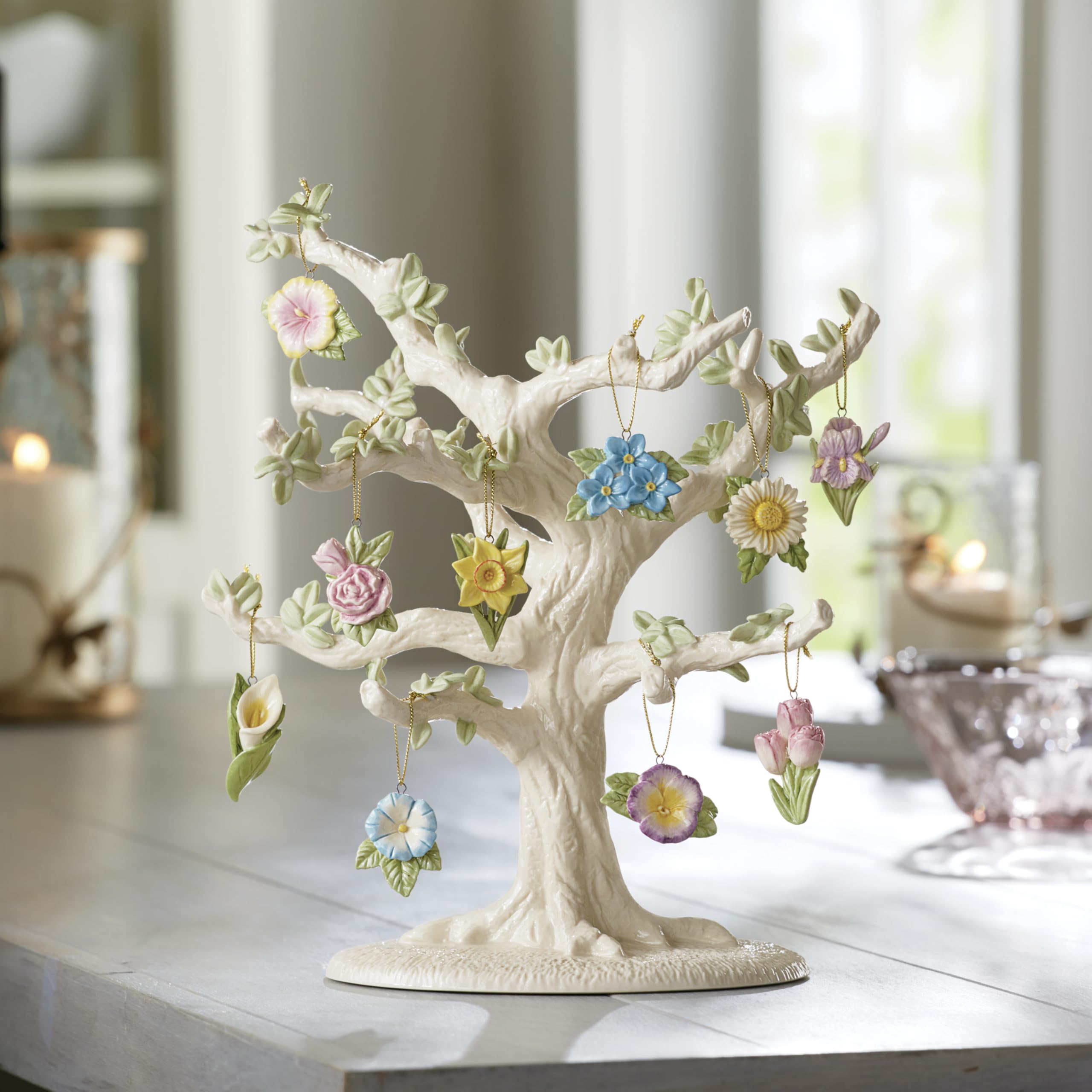 Lenox ivory porcelain tree shown next to books to indicate scale