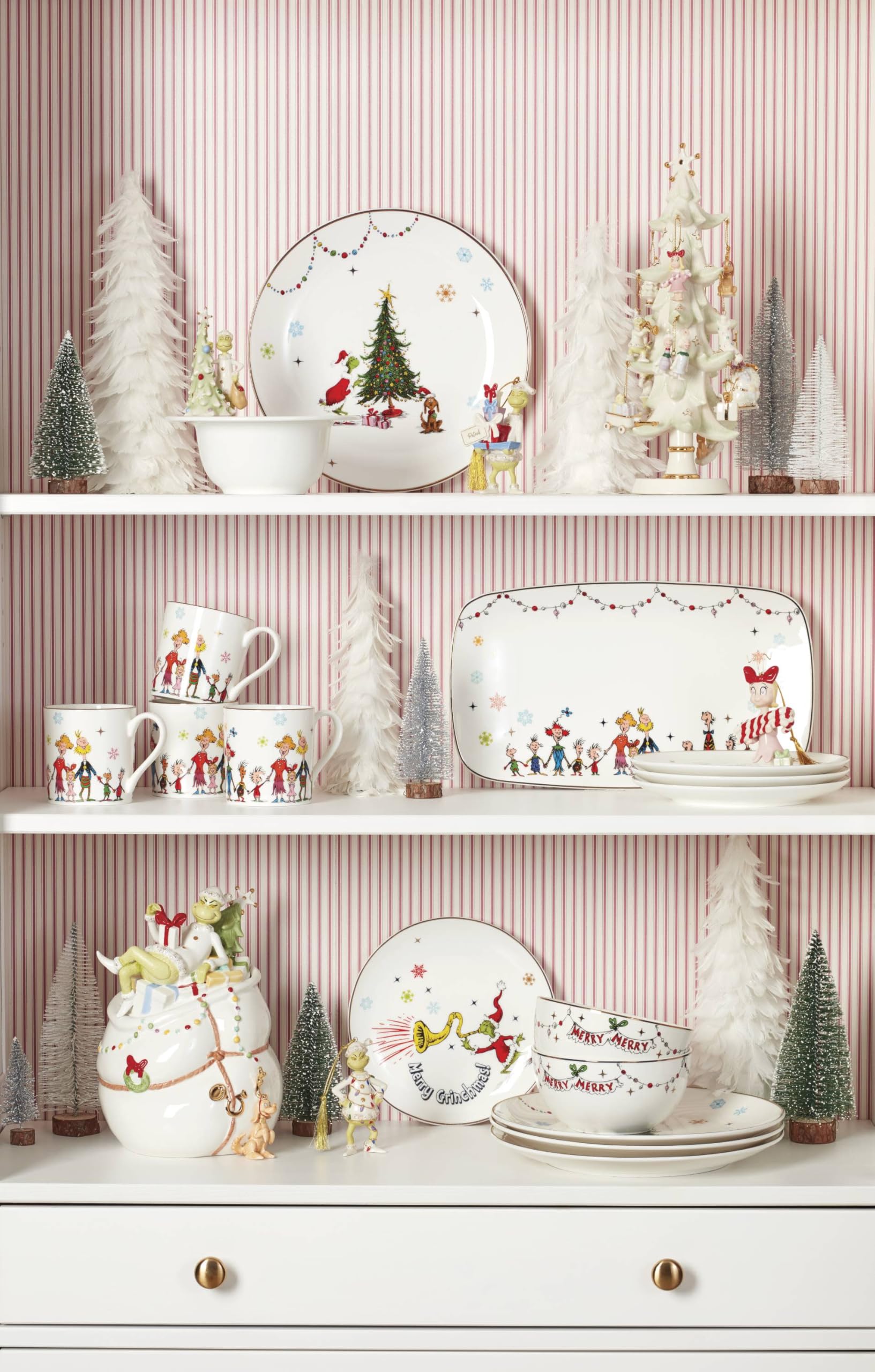 Lenox Merry Grinchmas plate held for scale showing 10.75 inch size and practical use