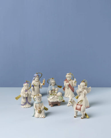Lenox close-up of angel and baby Jesus ornaments highlighting sculpted detail and glaze