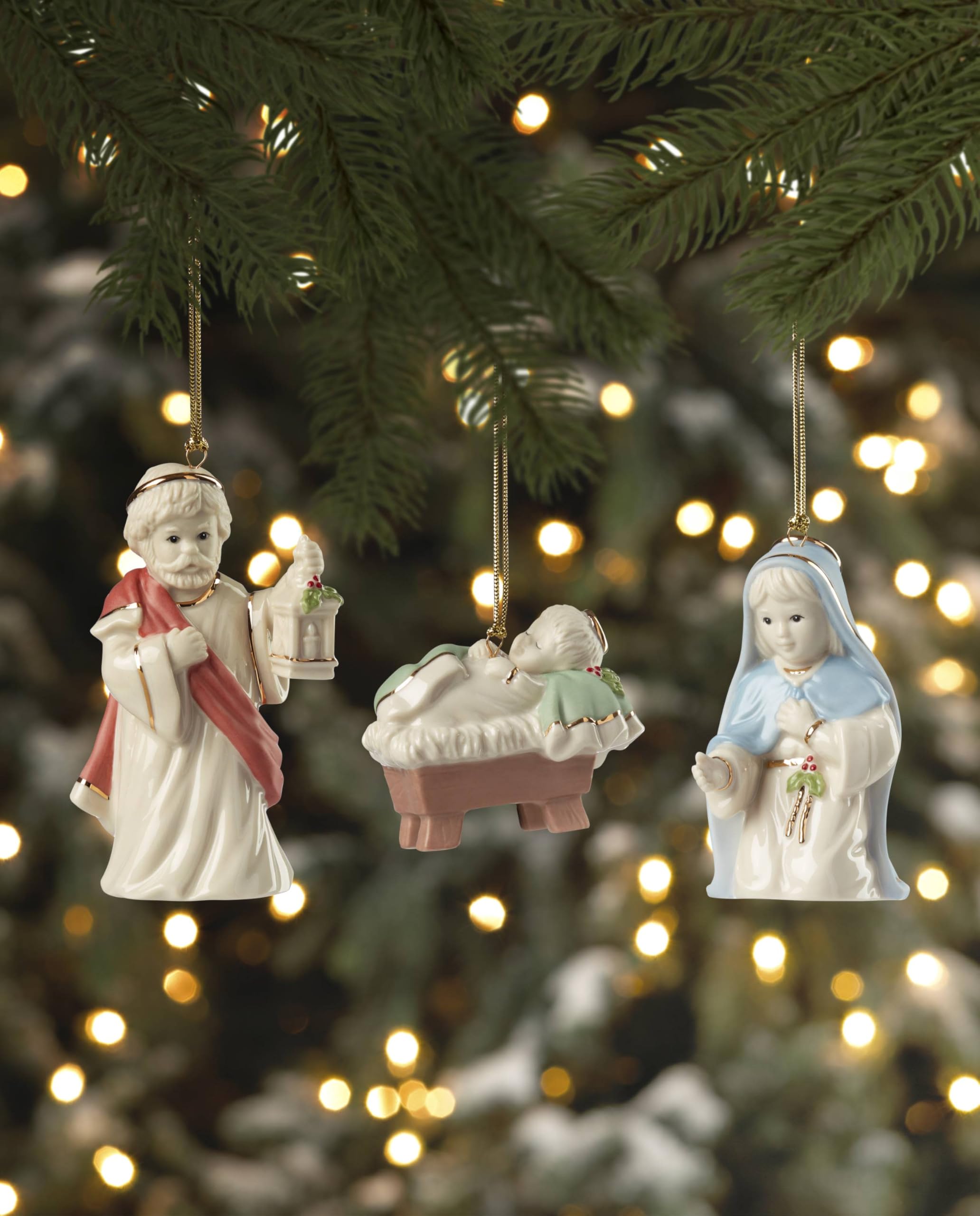 Lenox ornaments hung on a Christmas tree showing cohesive nativity display and seasonal warmth