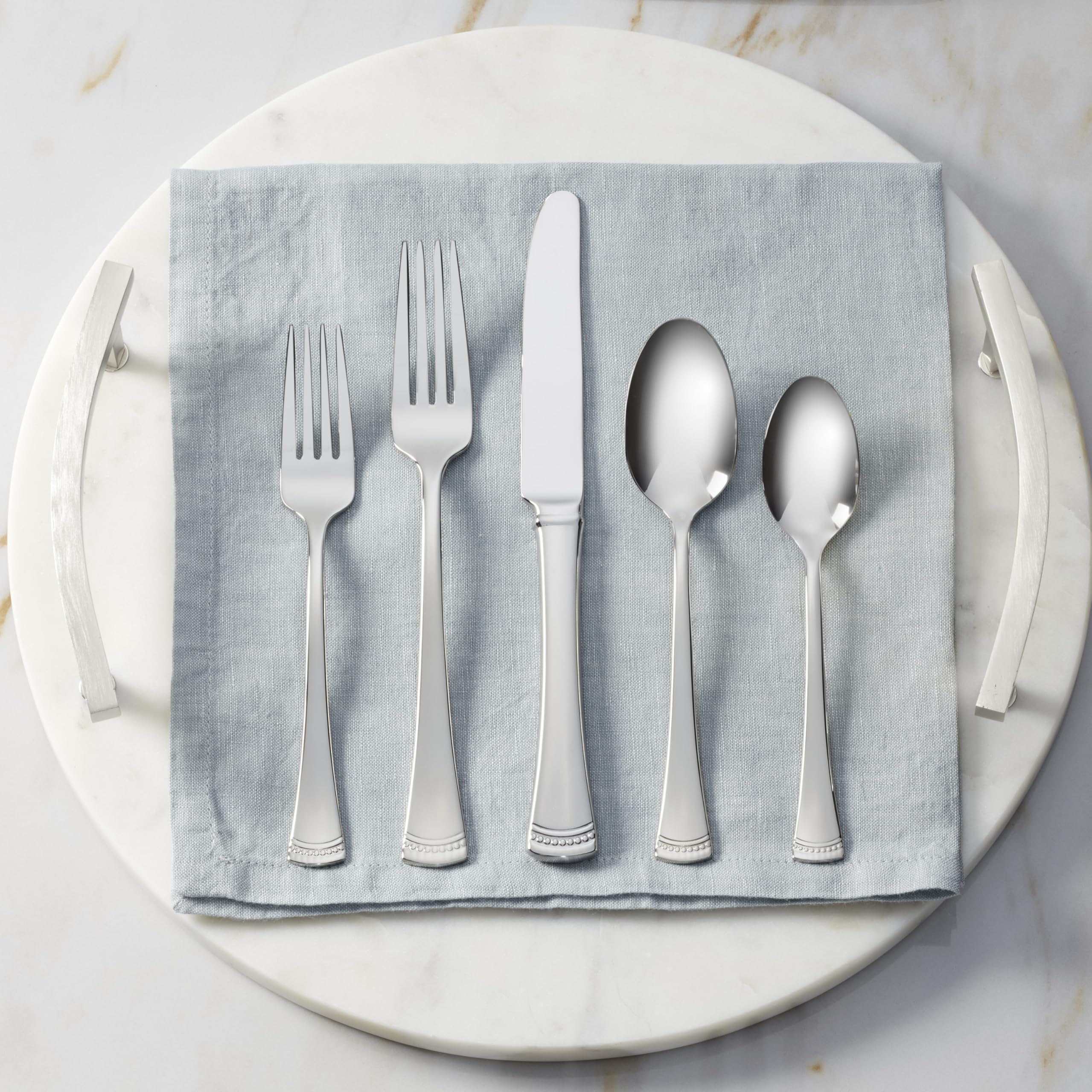 Lenox Portola dinner spoon bowl texture emphasizing polished mirror finish and easy cleaning