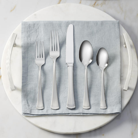 Lenox Portola dinner spoon bowl texture emphasizing polished mirror finish and easy cleaning