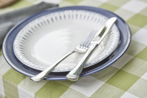 Lenox Portola pieces in dishwasher conveying dishwasher-safe convenience and lasting shine