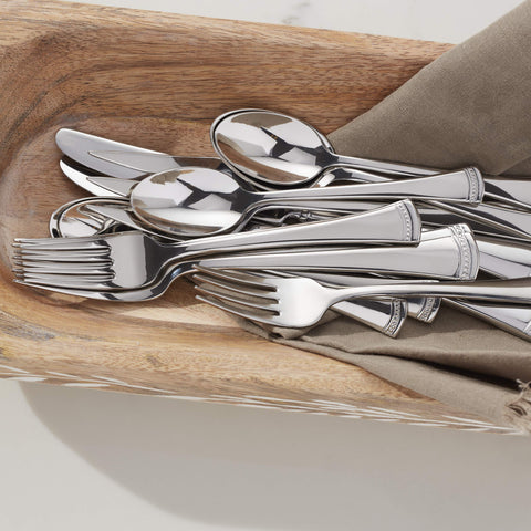 Lenox Portola flatware held in hand to show weight and ergonomic balance