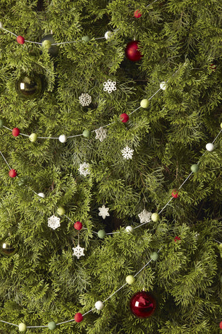 Lenox snowflake placed on wreath for added seasonal accent