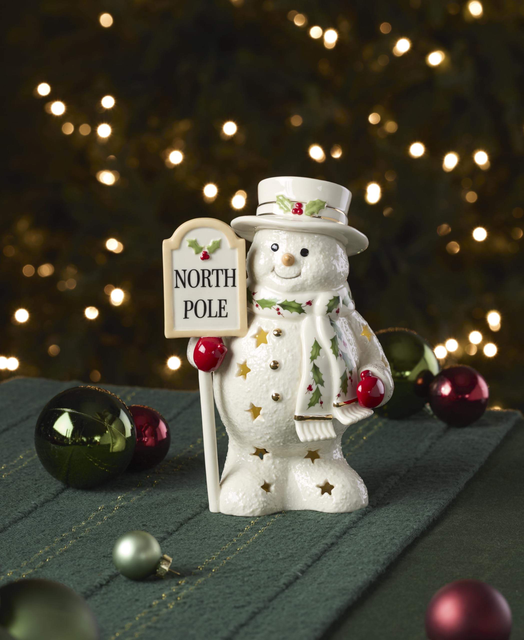 Lenox snowman illuminated on mantel providing warm ambient holiday lighting