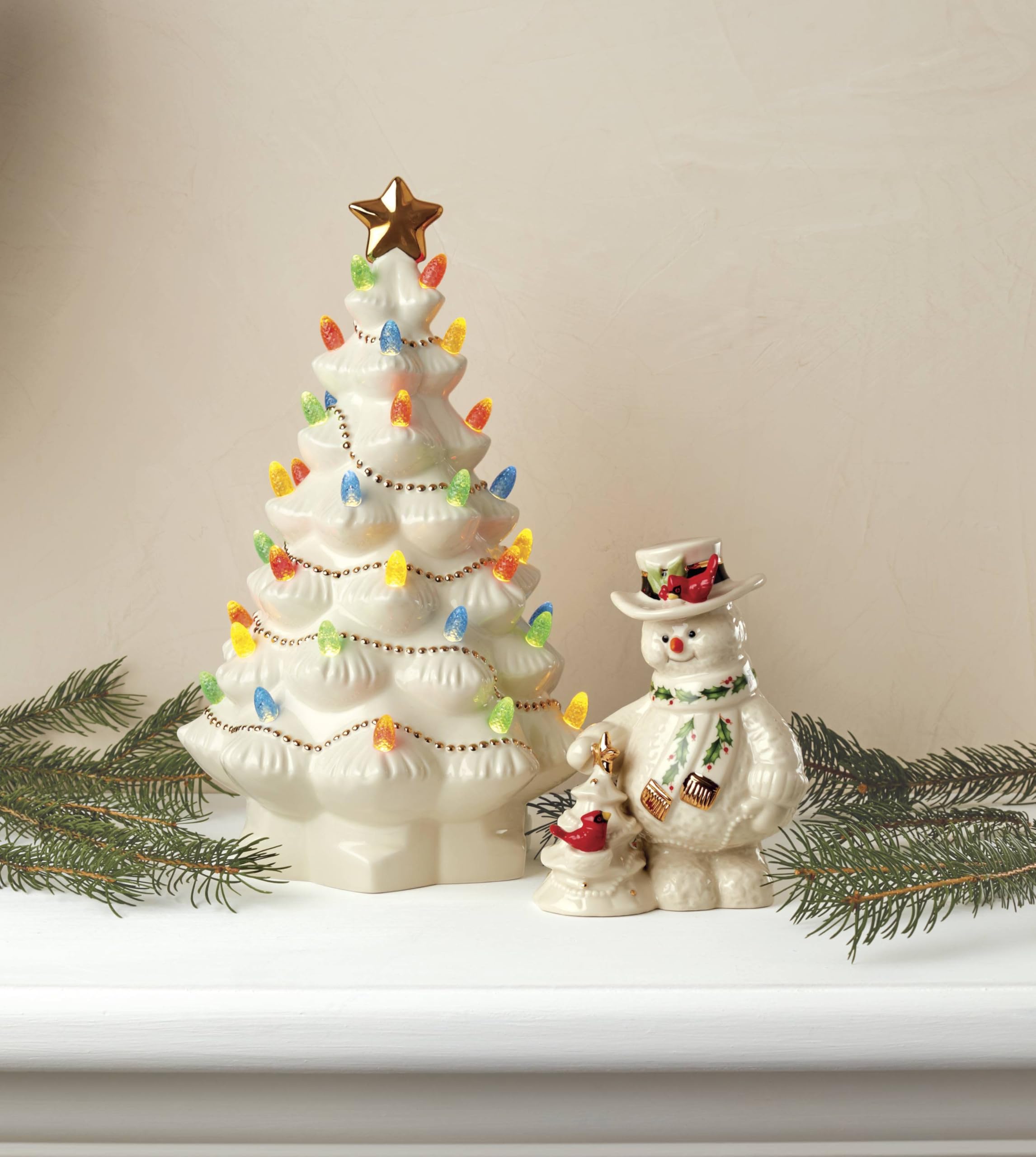 Lenox tree on mantel with warm lights creating seasonal focal point