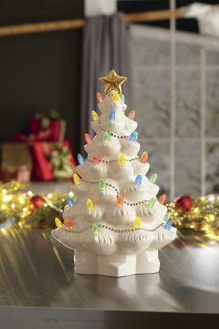 Lenox tree beside wrapped gifts illustrating gift-ready holiday style