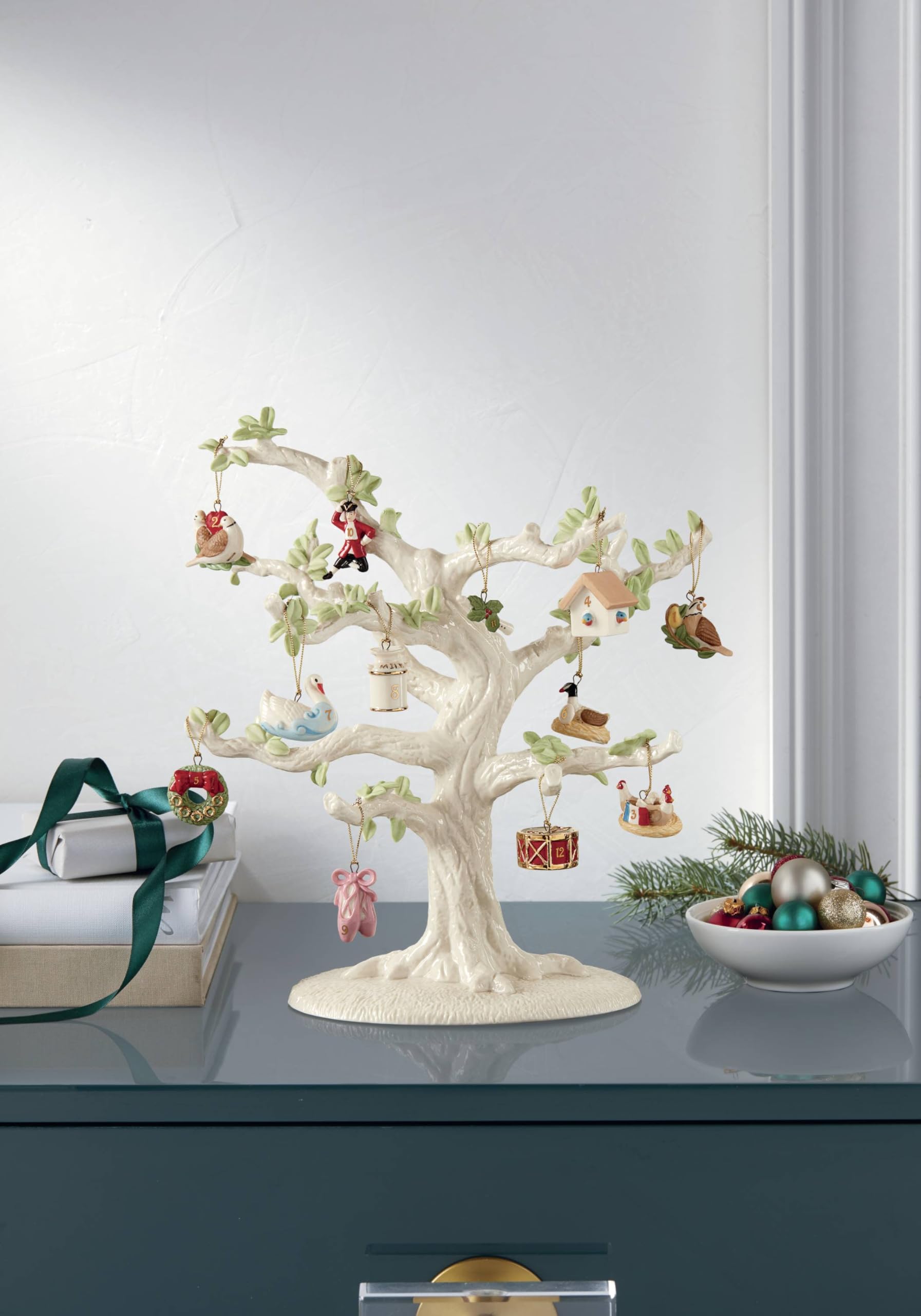 Lenox ornaments styled on a mantel to illustrate festive, curated decor