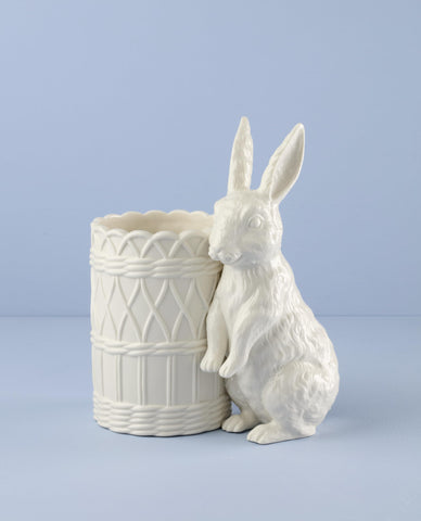 Lenox side profile detail highlighting sculpted ears and porcelain texture for delicate styling