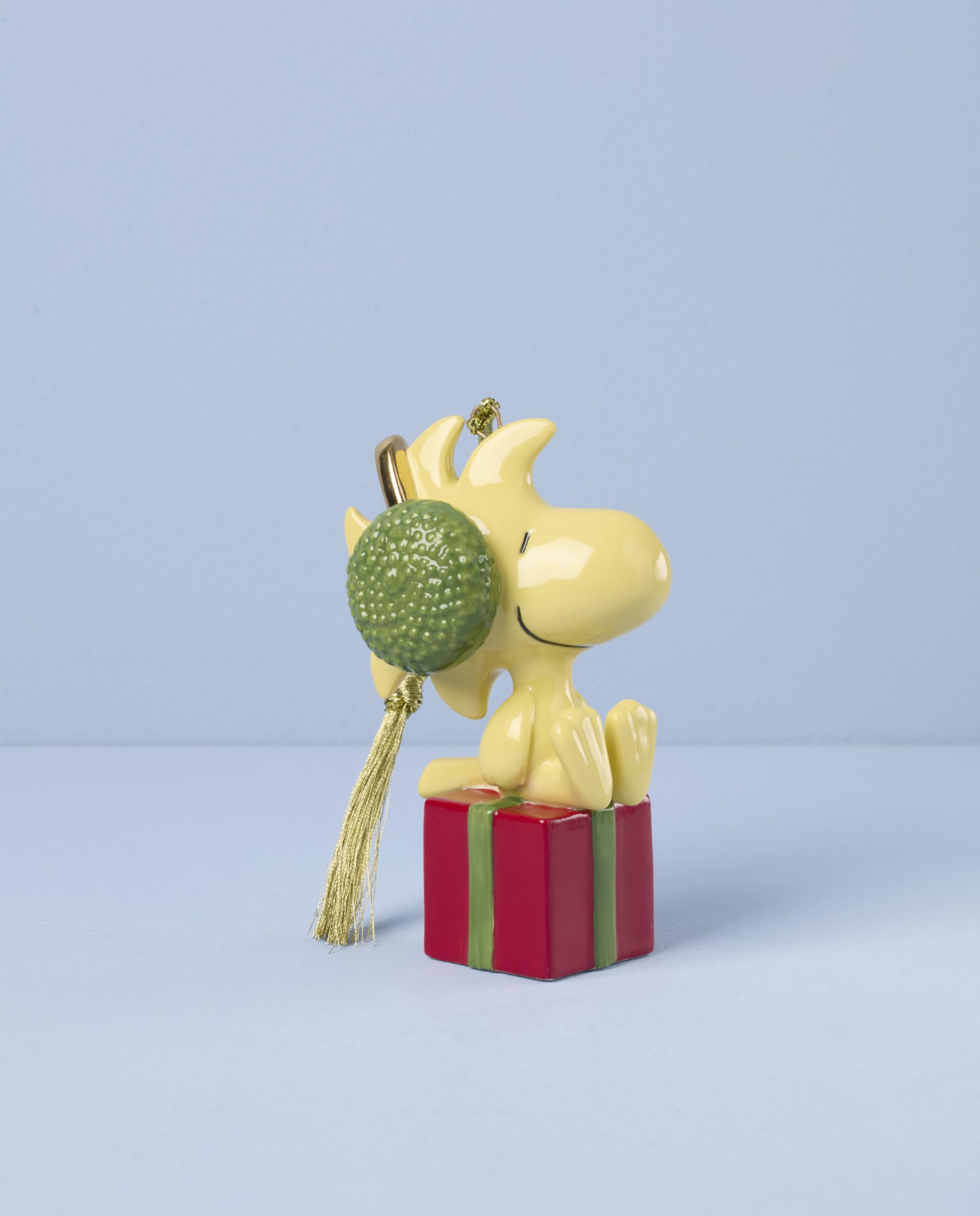 Lenox Woodstock hanging on a Christmas tree adding playful color and sparkle
