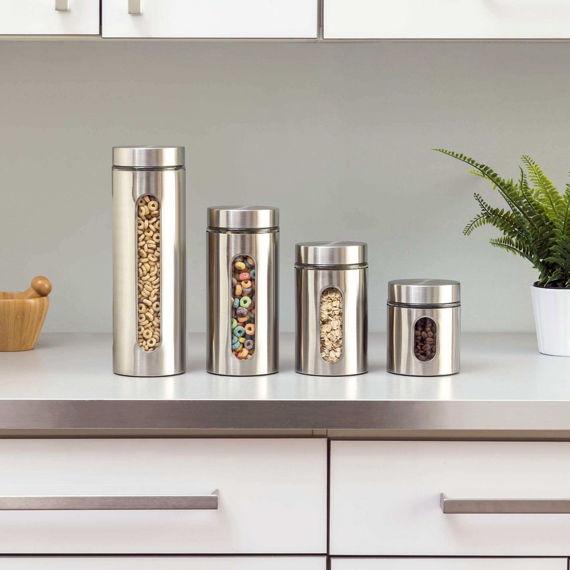Le'raze four canisters lined up to show graduated storage sizes
